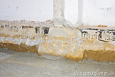 Preparatory stage for the construction of a ventilated crawl space in an old brick building against against the danger of radon Stock Photo