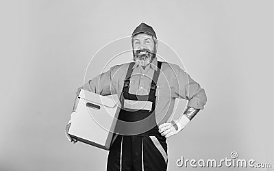 Prepare for moving. Rent house. Hipster moving out. Moving routine. Packaging things. Delivery service. Loader. Post Stock Photo