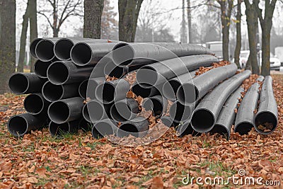 Prepared black polyethylene pipes for sewage Stock Photo