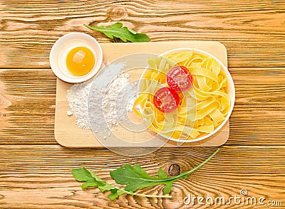 prepared spaghetti tagliatelle with cherry tomato Stock Photo