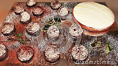 Prepared table with cream and lemon cake and fluffy champagne and chocolate foam desserts Stock Photo