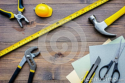 Preparing for appartment repair. Set of construction tools on wooden table background top view copyspace Stock Photo