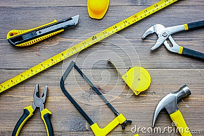 Preparing for appartment repair. Set of construction tools on wooden table background top view Stock Photo