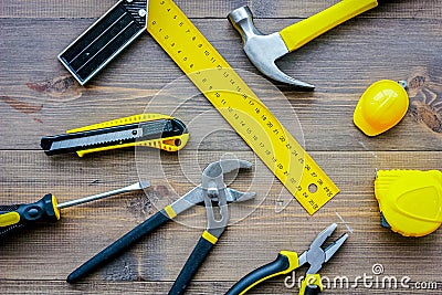 Preparing for appartment repair. Set of construction tools on wooden table background top view Stock Photo