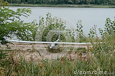 Preparing the army drones for the mission. Reconnaissance aircraft in the wild. Stock Photo