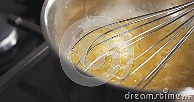 Preparing bechamel sauce boiling butter Stock Photo