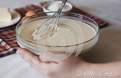 Preparing dough for pancakes Stock Photo