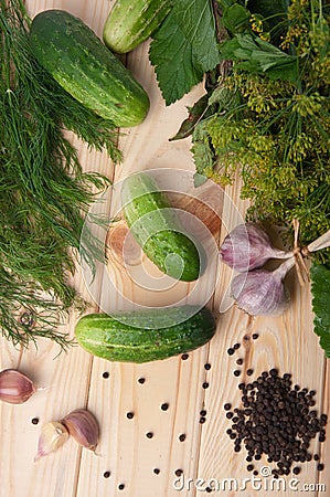 Preparing fresh cucumbers for pickling Stock Photo