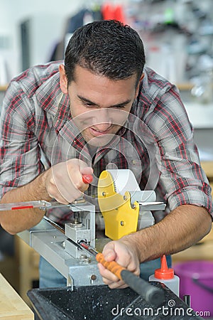 Preparing a golf club Stock Photo