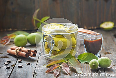 Preparing green walnut liqueur. Stock Photo