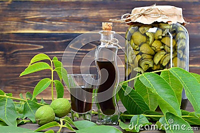 Preparing green walnut liqueur Stock Photo