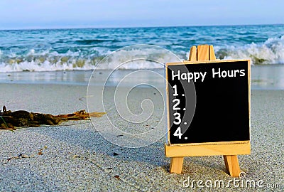 Preparing for Happy hours, Happy hours list on a blackboard. Stock Photo