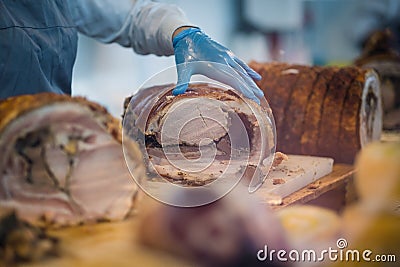 Preparing large roasted pork chops Stock Photo