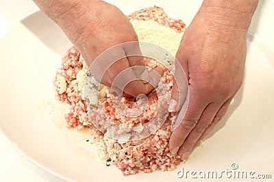 Preparing mince to make meatballs Stock Photo