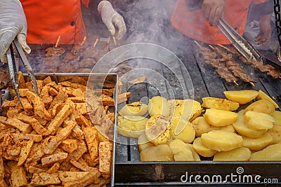 Preparing seasoned beef heart 'anticuchos' (Peruvian Gastronomy) Stock Photo