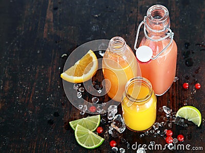 Preparing tasty healthy summer fruit juices Stock Photo