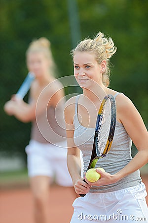 Preparing for tennis service Stock Photo