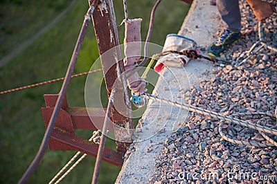 Preparing to jump from the bridge, fear of jumping, equipment for jumping Stock Photo