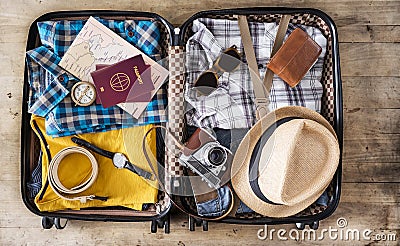 Preparing travel suitcase high angle view Stock Photo