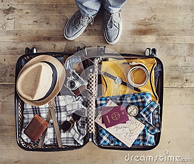 Preparing travel suitcase high angle view Stock Photo