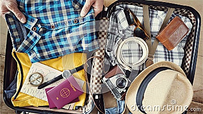 Preparing travel suitcase high angle view Stock Photo