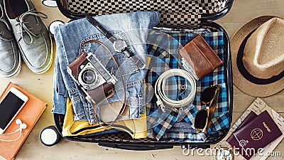 Preparing travel suitcase high angle view Stock Photo