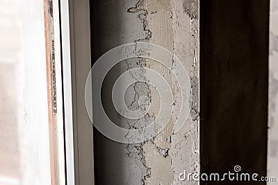 Repair in the slopes of the window. The process of applying a layer of plaster on the sides of the Stock Photo