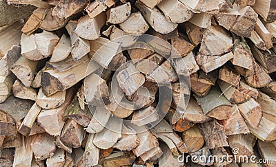 Preparing for winter: neat stacks of split wood Stock Photo