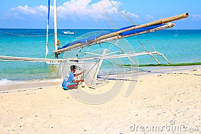 Prepping the sailing boat for a trip around the island Editorial Stock Photo