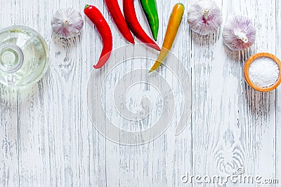 Prepring for cooking dinner. Peper on wooden table background top view copyspace Stock Photo