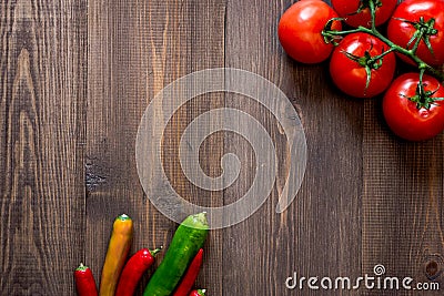 Prepring for cooking dinner. Tomato and peper on wooden table background top view copyspace Stock Photo