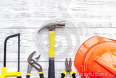 Preraring for home repair. Contruction tools on grey wooden desk background top view copyspace Stock Photo