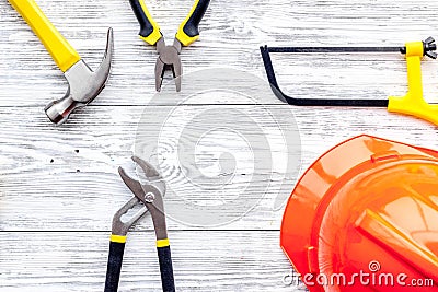 Preraring for home repair. Contruction tools on grey wooden desk background top view copyspace Stock Photo