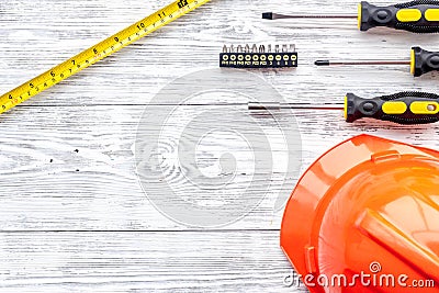 Preraring for home repair. Contruction tools on grey wooden desk background top view copyspace Stock Photo