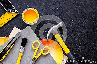 Preraring for home repair. Tools on balck stone desk background top view Stock Photo