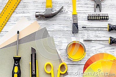 Preraring for home repair. Tools on grey wooden desk background top view copyspace Stock Photo