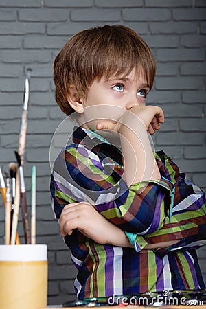 Preschool boy learns to think creatively Stock Photo