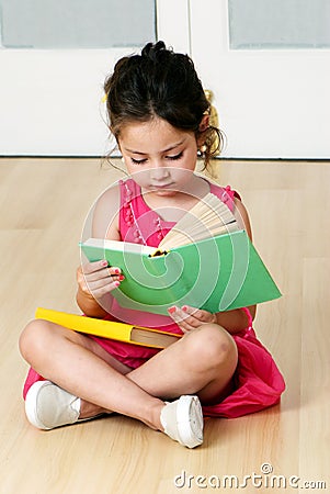 Preschooler with book Stock Photo
