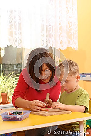 Preschooler with wooden blocks Stock Photo