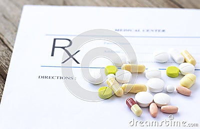 Prescription form and medicines on the desk . Stock Photo