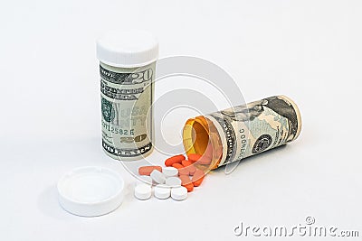 Prescription Medication Bottles with Money Stock Photo