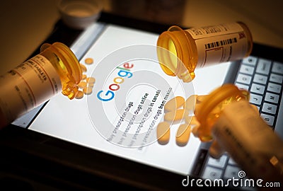 Prescription Medication on an Electronic Tablet Editorial Stock Photo