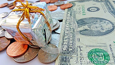 Present box with American coins with dollar usa background Stock Photo