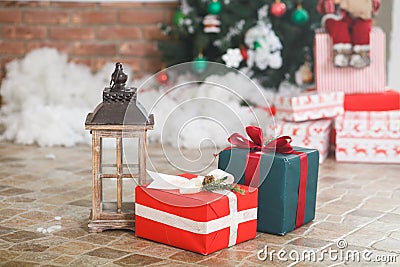 Present boxes under fir-tree Stock Photo