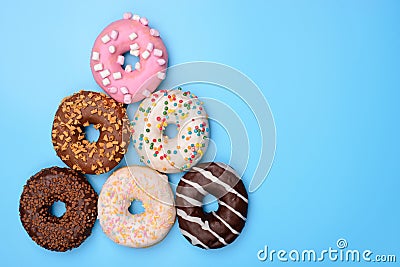 Present Christmas gift concept. Top above overhead flat-lay flatlay close up photo of lot of funny joking donuts making winter Stock Photo