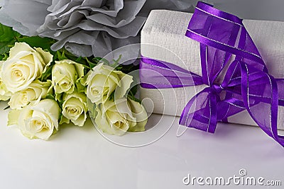 Present with flower for annyversary with copy space Stock Photo