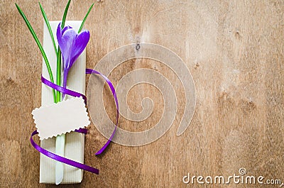 Present with fresh flower and blank note. Stock Photo