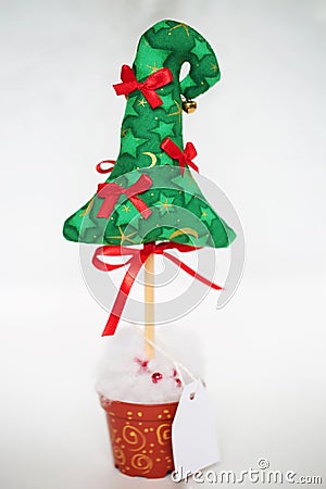 Present green christmas tree with red ribbon Stock Photo