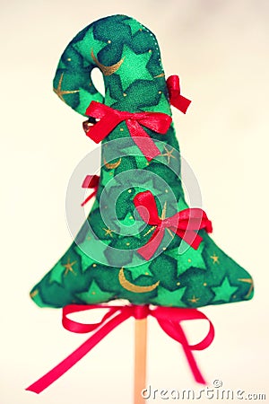 Present green christmas tree with red ribbon Stock Photo