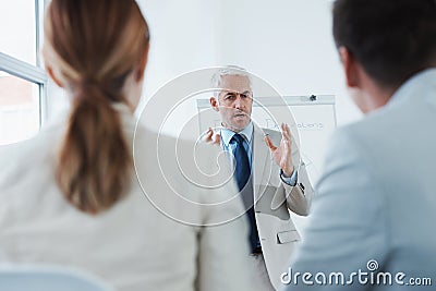 Presentation, coaching or seminar with business man in boardroom of office for employee upskill development. Training Stock Photo